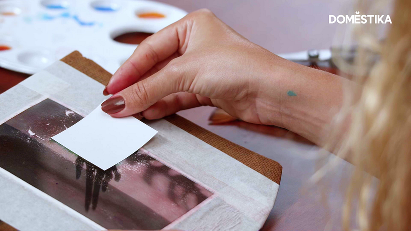 Protect the colored area with paper.