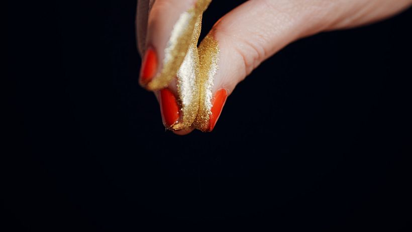 It uses resin varnish and gold dust.