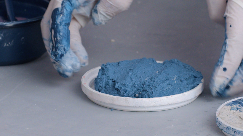 Fill the mold with concrete mixture.