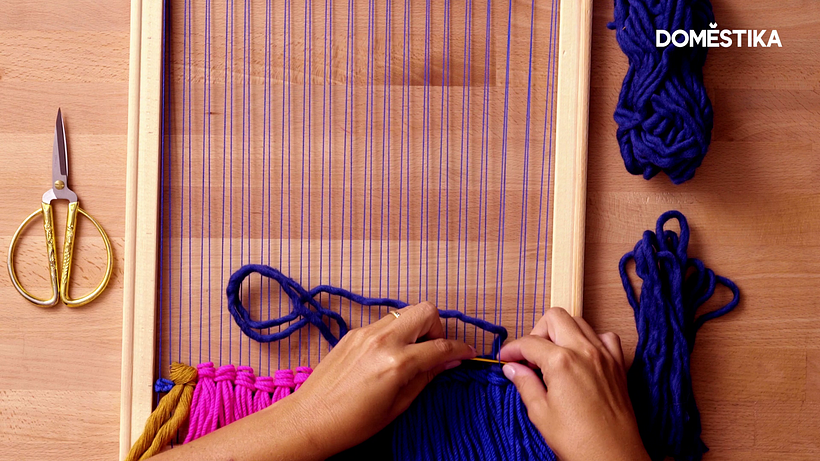 Start with a plain weave to support the tassels.