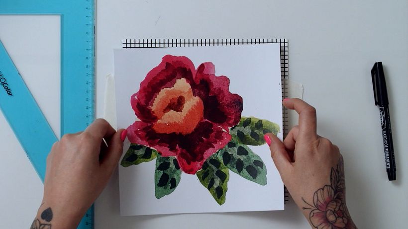 Glue the grid and your design onto a lightbox.