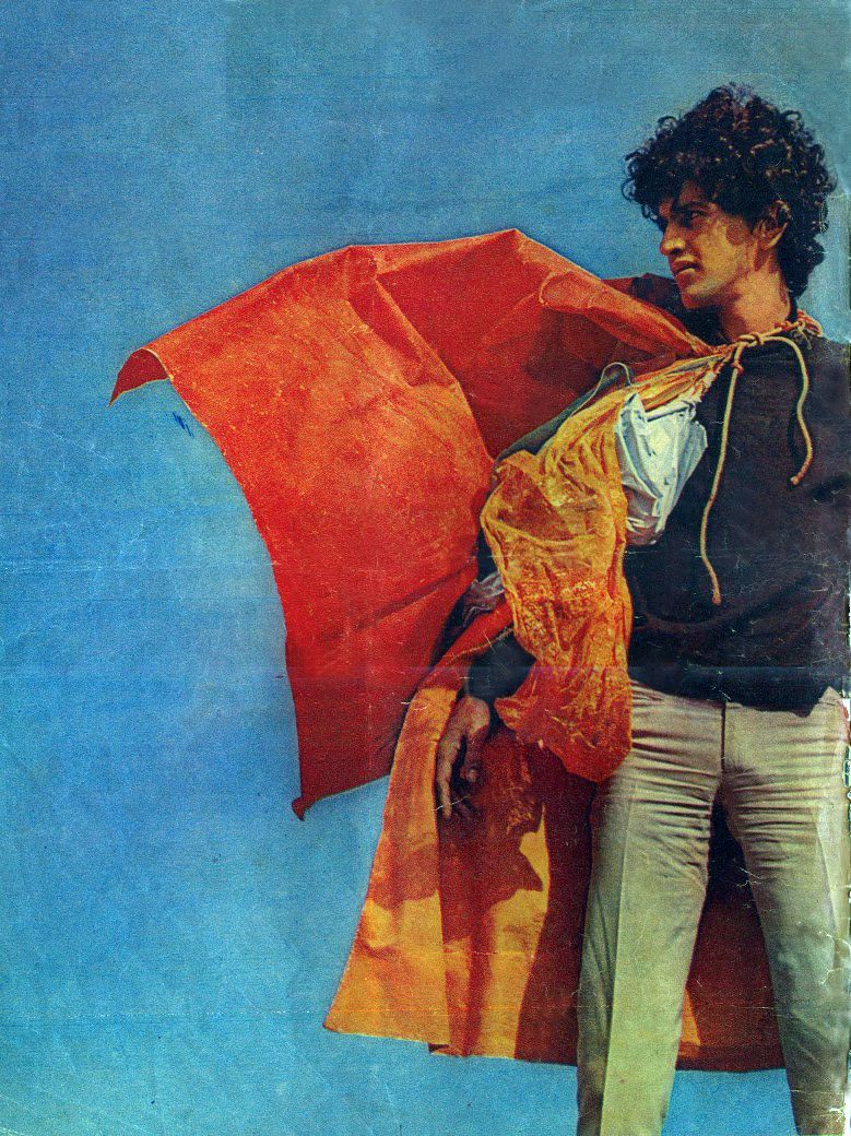 Caetano Veloso as the subject of one of Hélio Oiticica's pieces, "Parangolés."