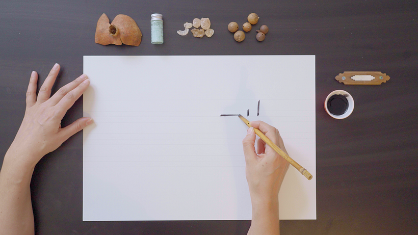 Horizontal strokes run parallel to your guide marks.