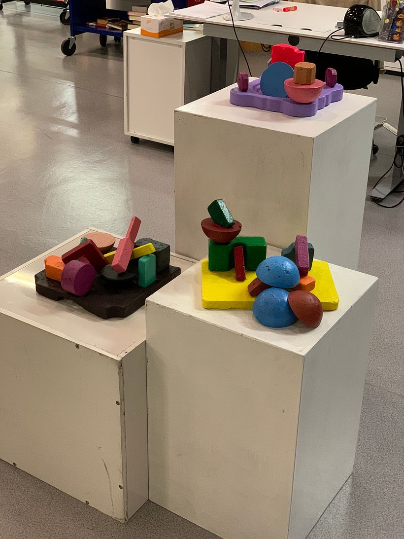 Colourful interactive concrete sculpture. A mix of acrylic paint and spray paint as finishes. 