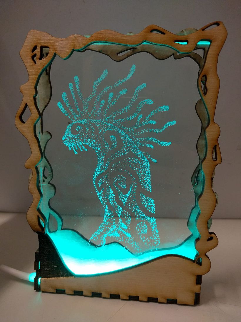 I made both the glass-art and the frame. The frame was made with a lasercutter.