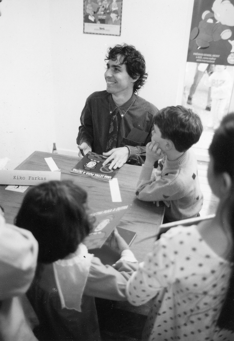 Kiko signing autographs.