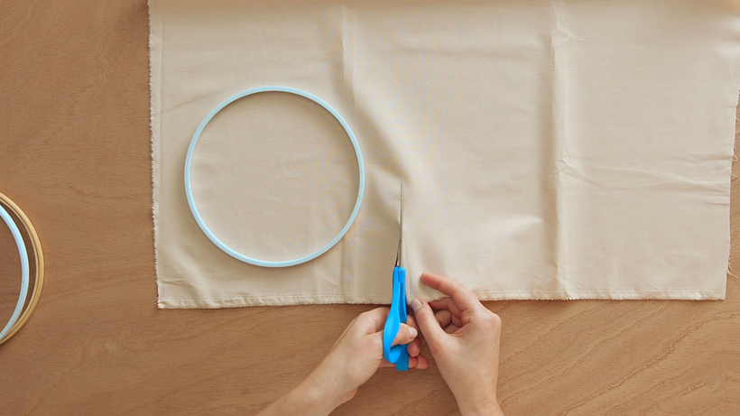 Cut a rough square around your hoop
