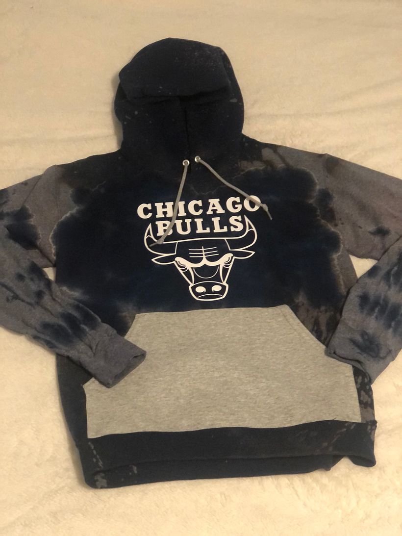 I redid this hoodie using parts from a gray hoodie and creating a vinyl along w bleaching.