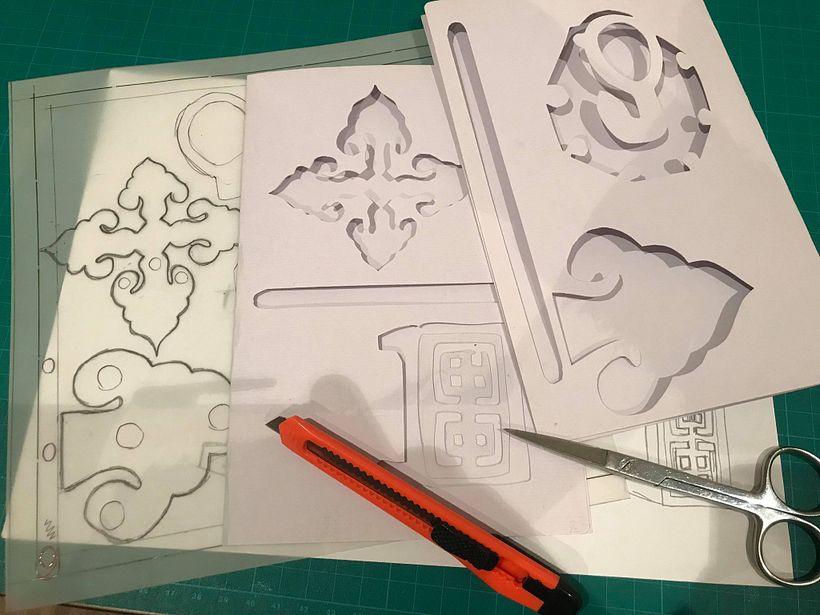tracing and cutting out shapes for end papers
