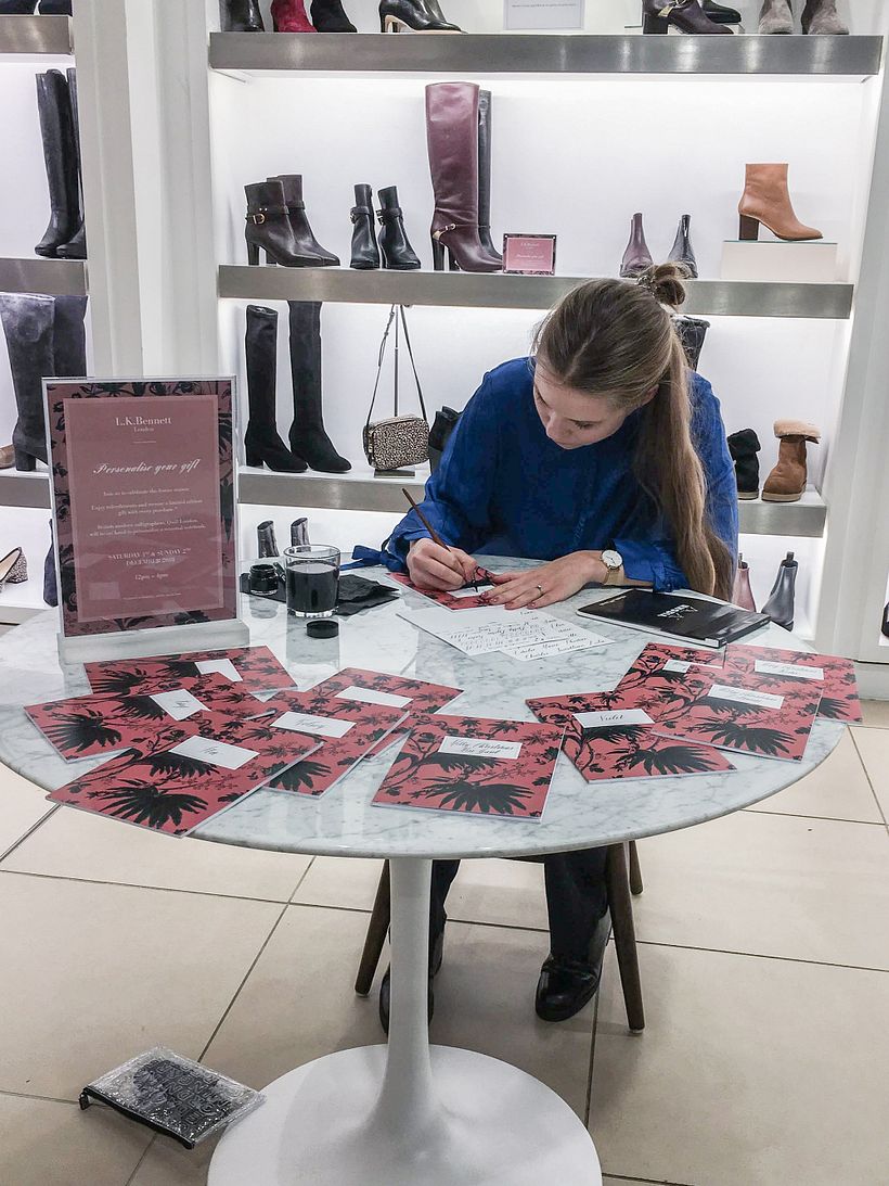 Personalising notebooks in-store for L.K. Bennett.