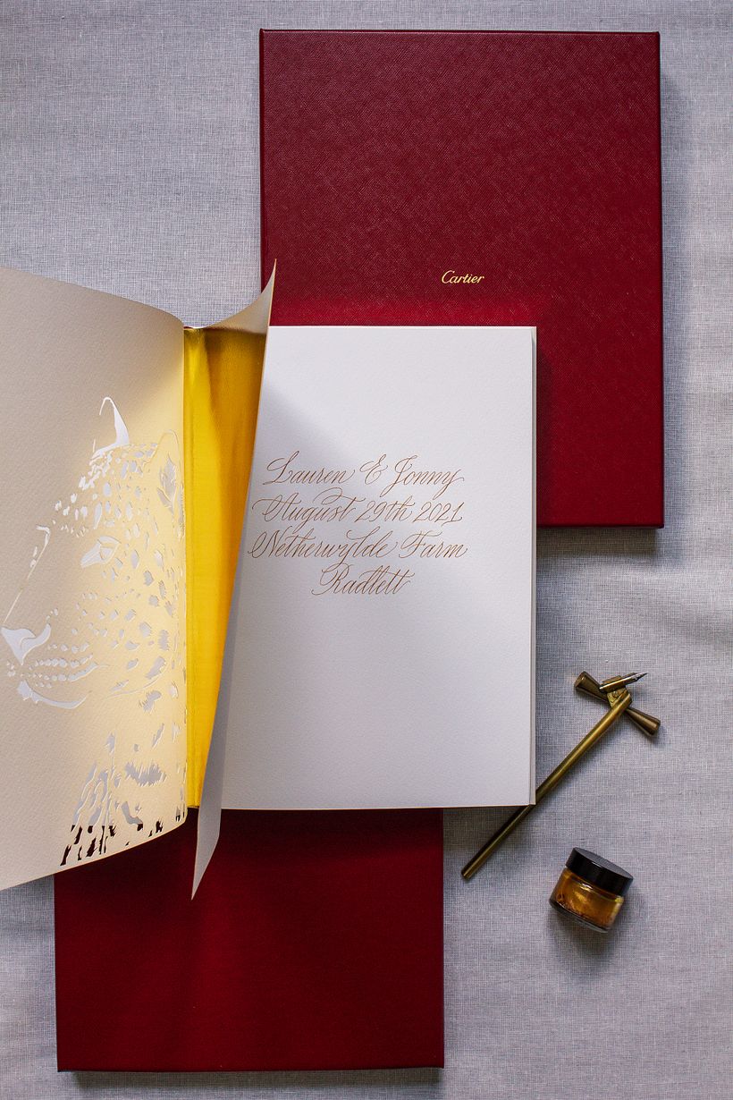Calligraphy personalisation in a wedding guest book for Cartier.