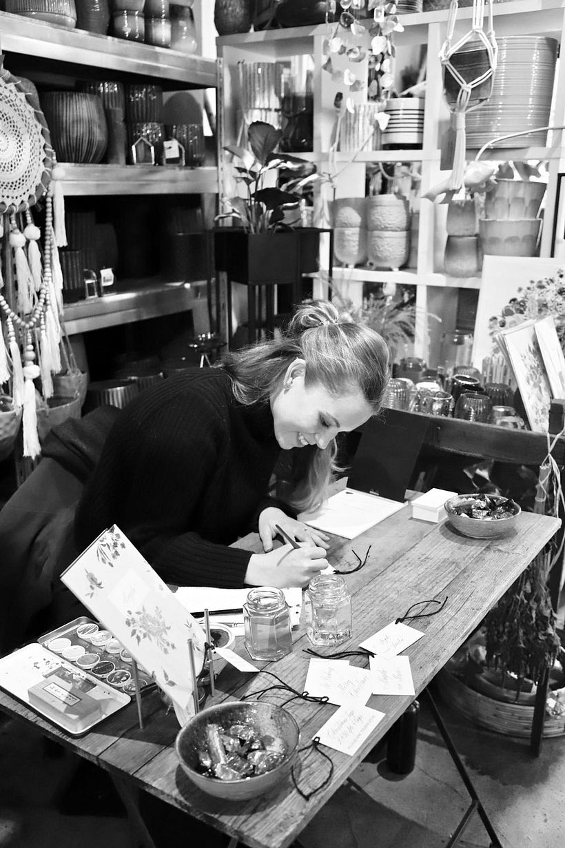 Personalising Christmas gifts at Birksen, London.