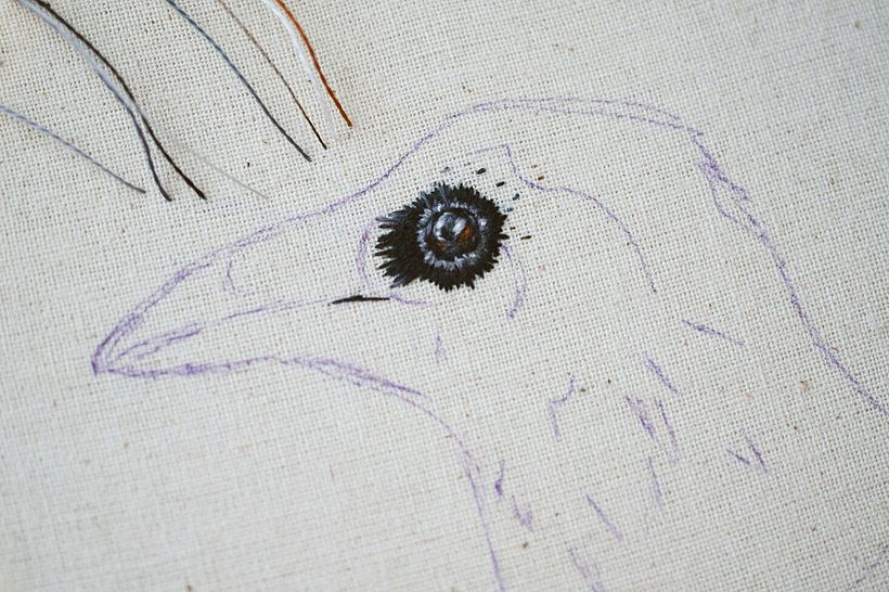 First stitches - you can see all the colors I used to embroider the eye in the left corner of the image.