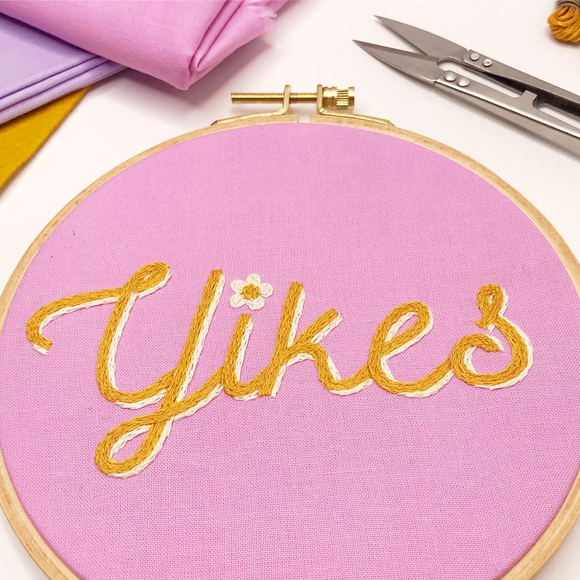 Yikes hoop, cotton thread on organic cotton. 6" dia.