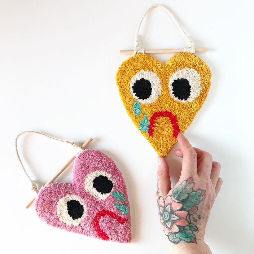 "Sad Heart" wall hanging. Hand tufted using cotton yarn on cotton fabric. Backed with wool blend felt.