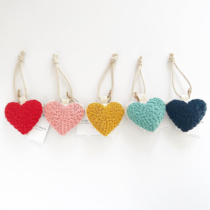 Hand tufted heart ornaments.