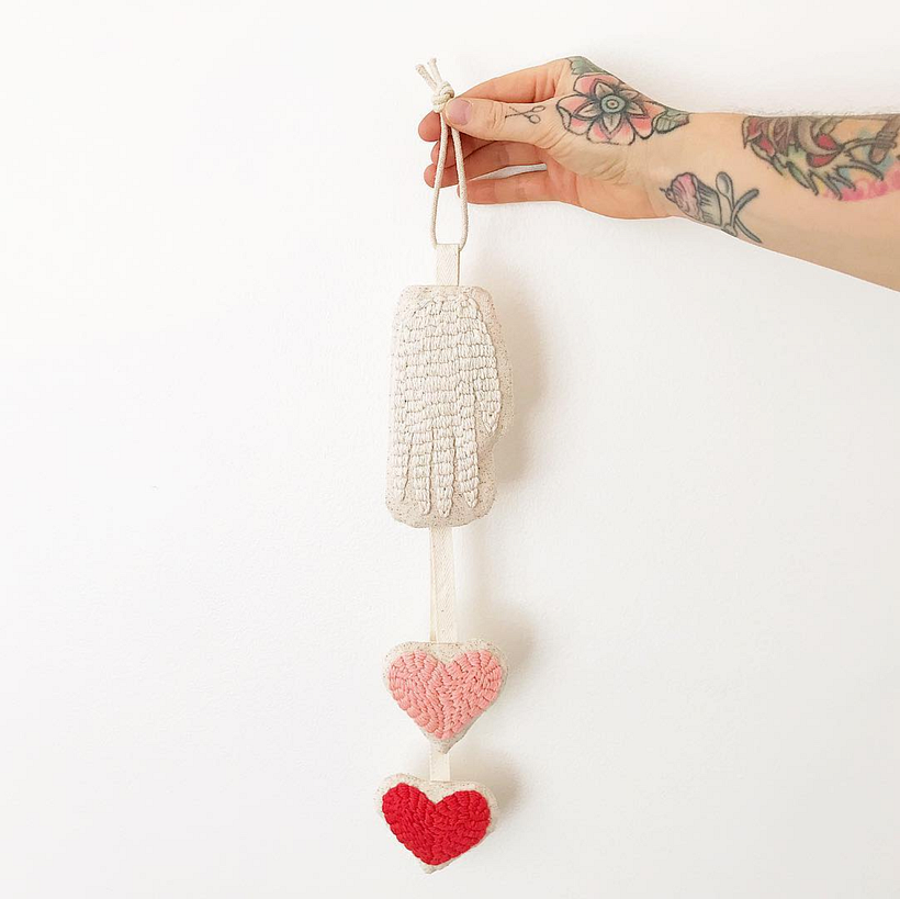 Hand tufted "Hand to Hearts" soft sculpture mobile.