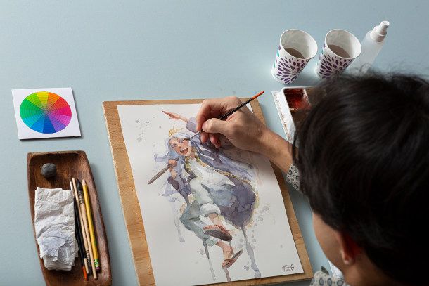 Geoff trabalhando com os materiais básicos para criar mangás em aquarela