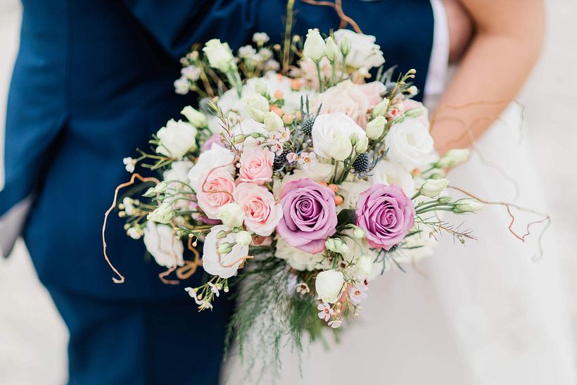 Wedding bouquet image supplied for reference.