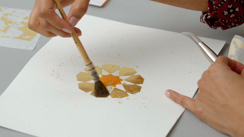 Brush away any excess gold with your mop brush