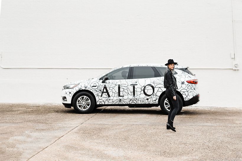this is a driving app service and we wrapped one of the cars with my design! 