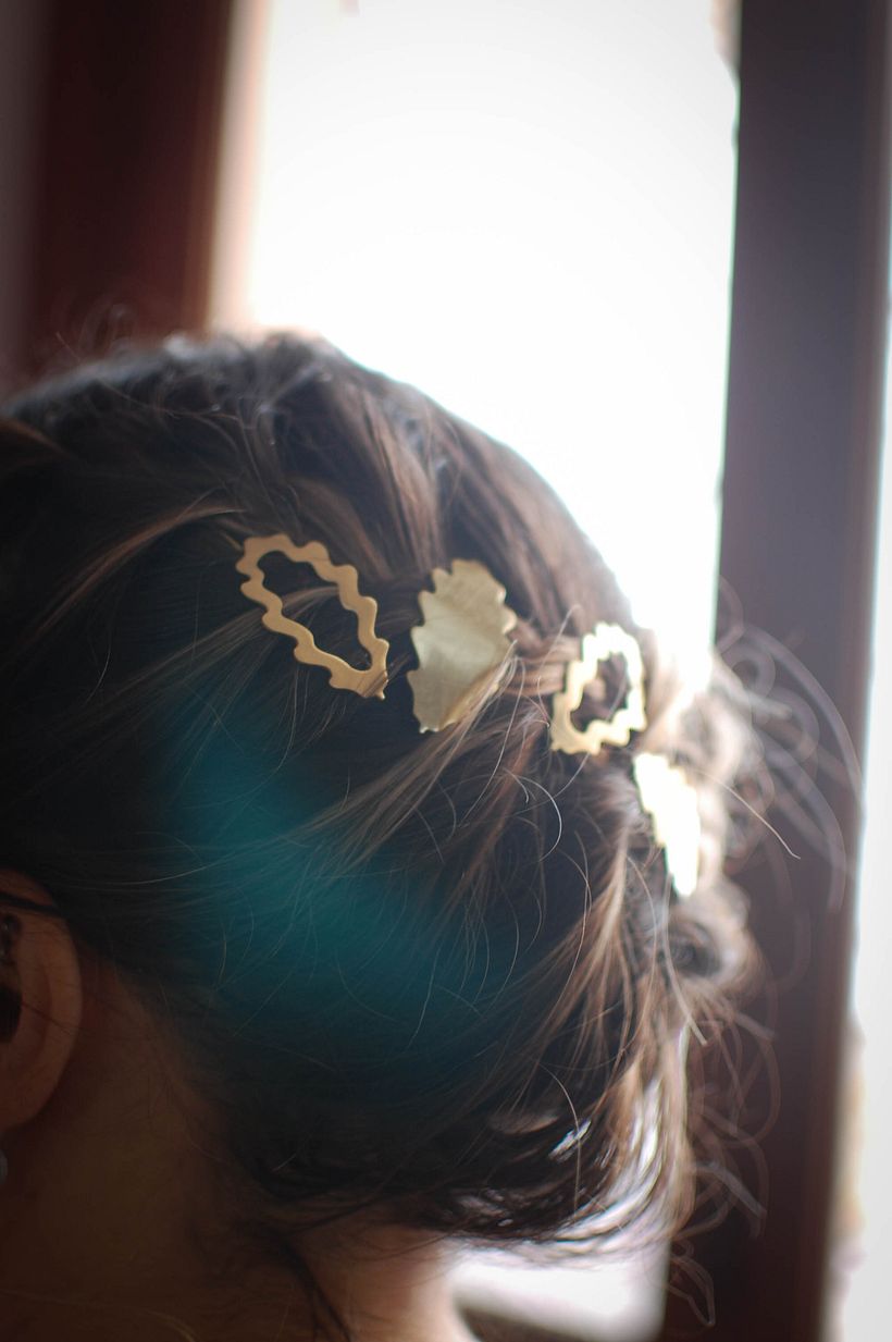 Gespen in de vorm van eikenbladeren.