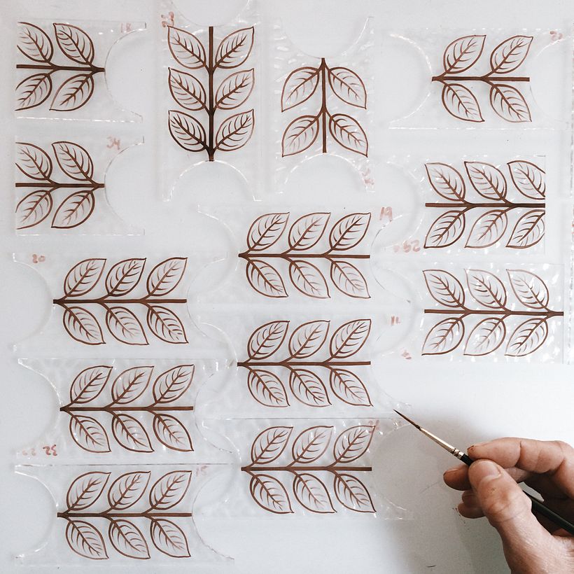 Painting the leaf details for the border.  There were a lot of pieces to paint, all by hand.