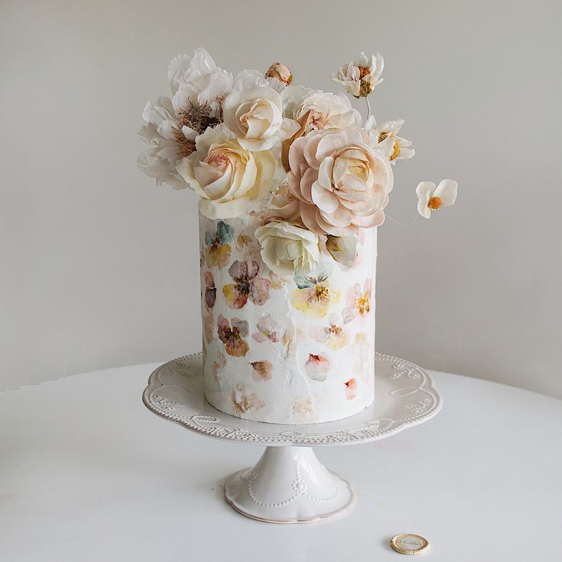 Hand painted pansies with hand-crafted sugar and crepe paper flowers