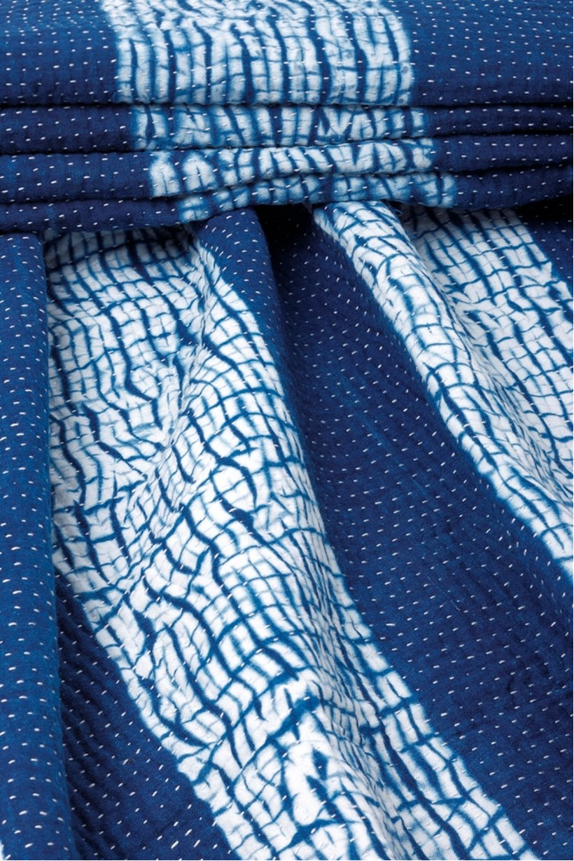 A piece of fabric dyed using the shibori technique.