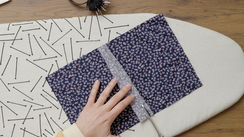 Cut approximately half away from the right hand side of the seam