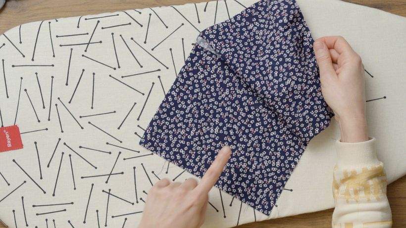 Fold your fabric reverse-side facing outwards so that the seam is enclosed inside