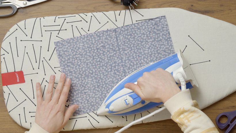 Iron your piece flat, reverse-side up