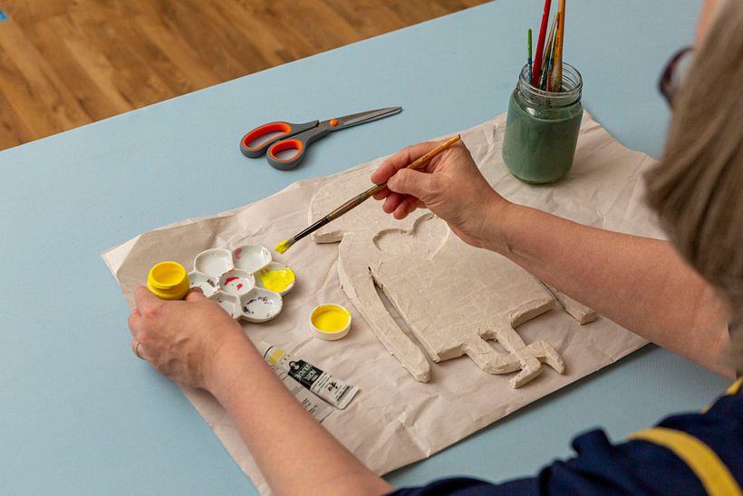 Creating paper mache sculptures is a time-consuming but relaxing process.