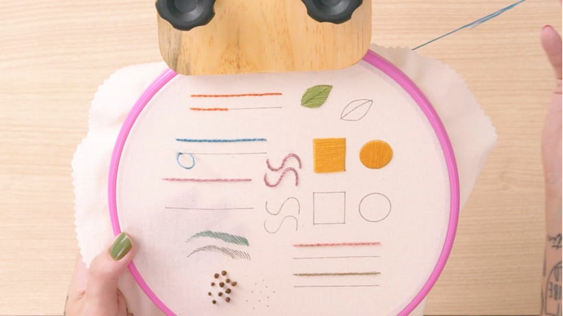  Instead of stitching back down the previous hole, push the needle through the fabric half way through the previous stitch