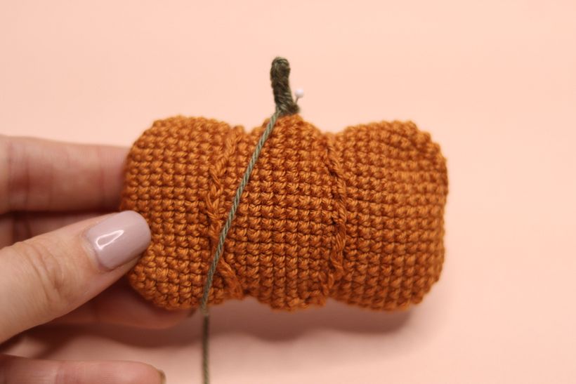 Notice how the stalk is attached to the pumpkin: step one.