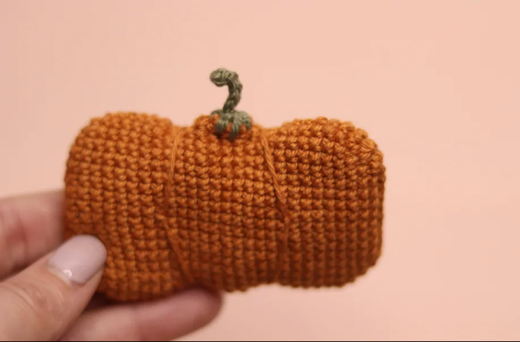 An example of a pumpkin with detail lines crocheted in after.