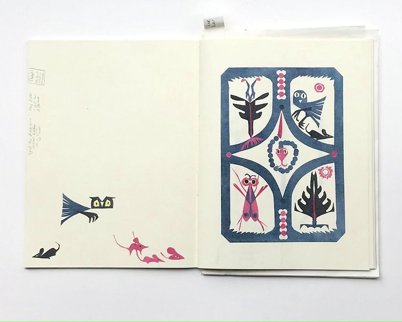 A garden created from imagination by combining a paper cut with paper cut scraps.