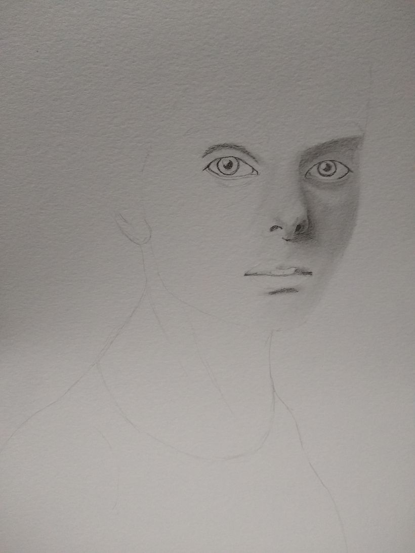 Aplicando el grafito sobre el boceto original que luego modifiqué