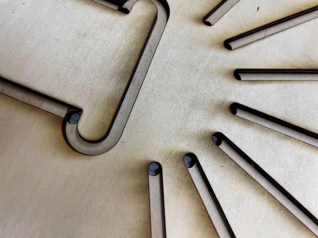 detail shot of the sign channels and the holes for wire routing.