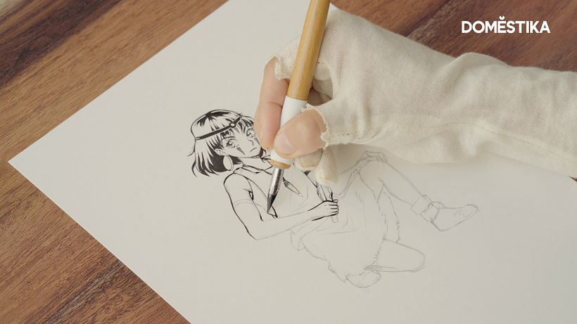 Use your ink and G pen to begin filling in the details