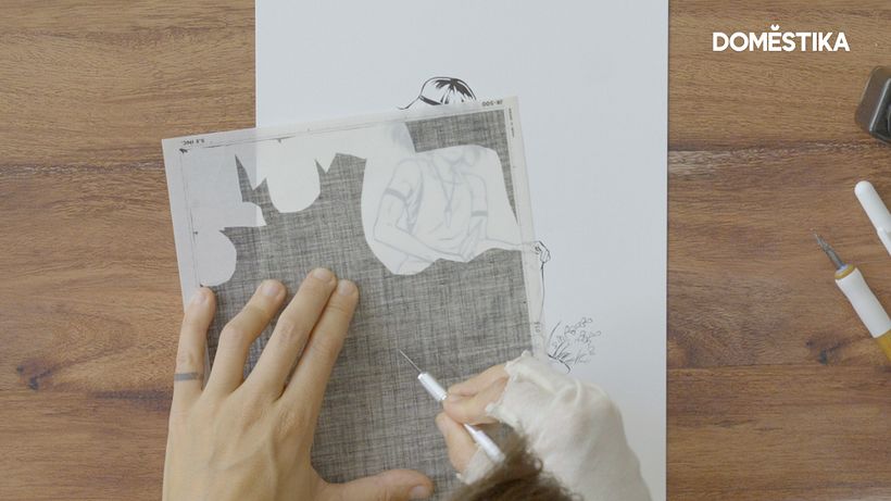 Use your knife to cut out the shape of the skirt on your screentone