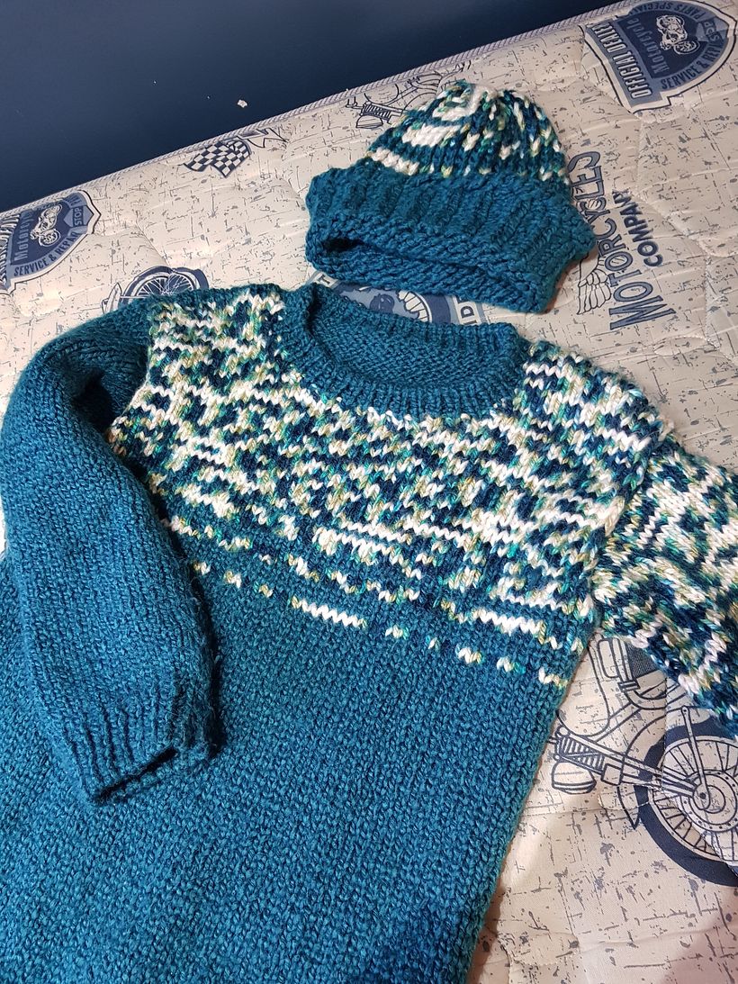 Prenda en punto jersey con y un detalle en lana matizada