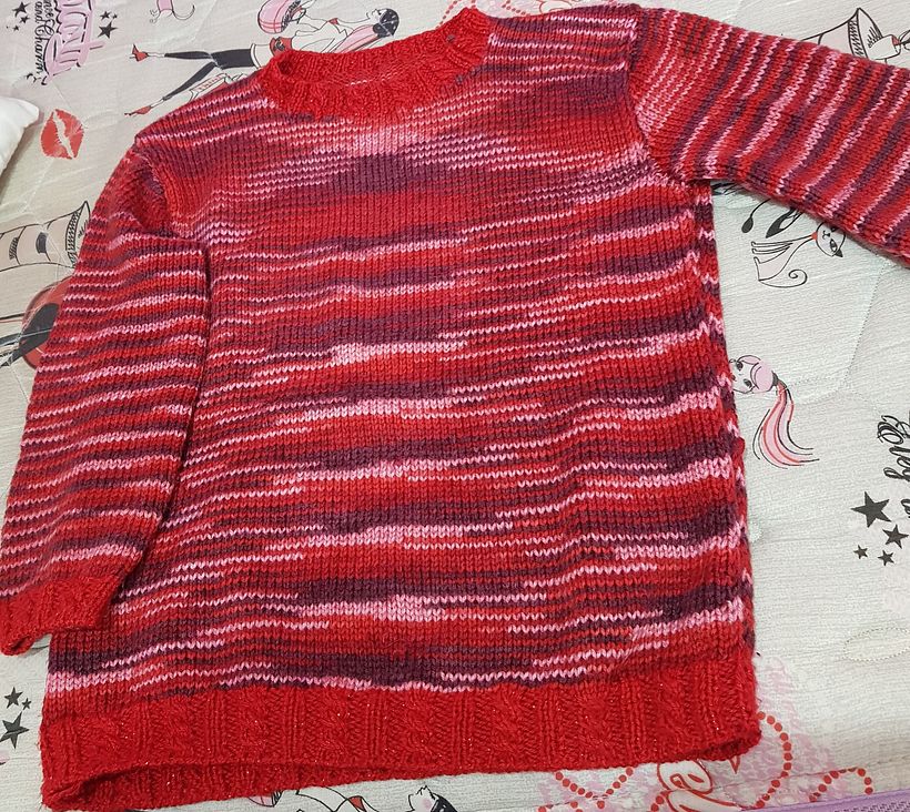 Buso en punto jersey y puño con trenzas