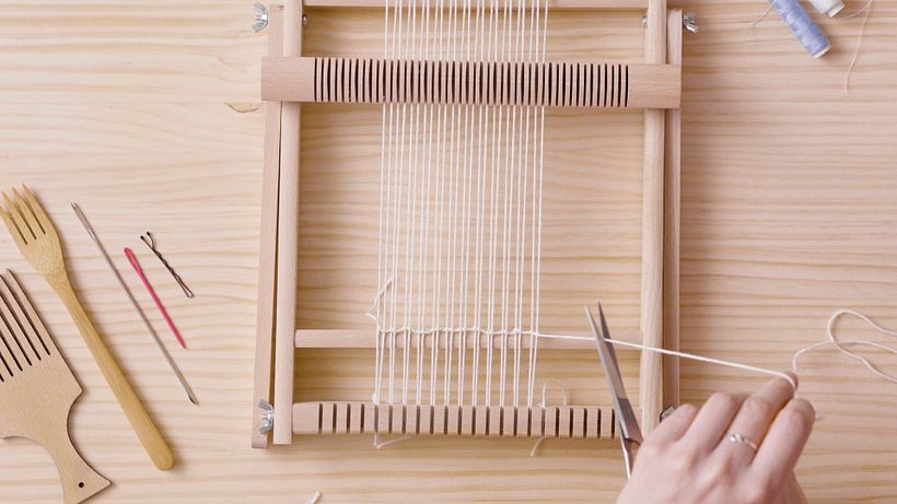 Tie your row of knots along the bottom.