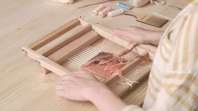 Turn your loom over to tie and trim any loose ends.
