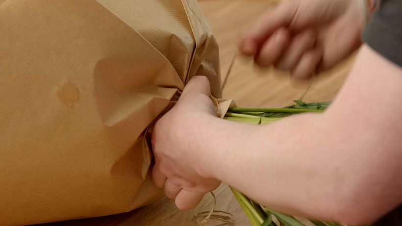 Secure the paper in place with some more twine