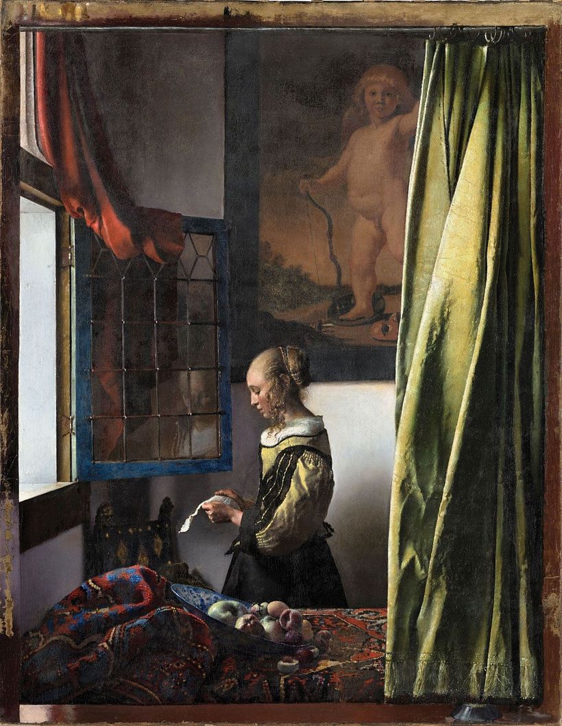 Cupid hidden in Vermeer’s Girl Reading a Letter at an Open Window.