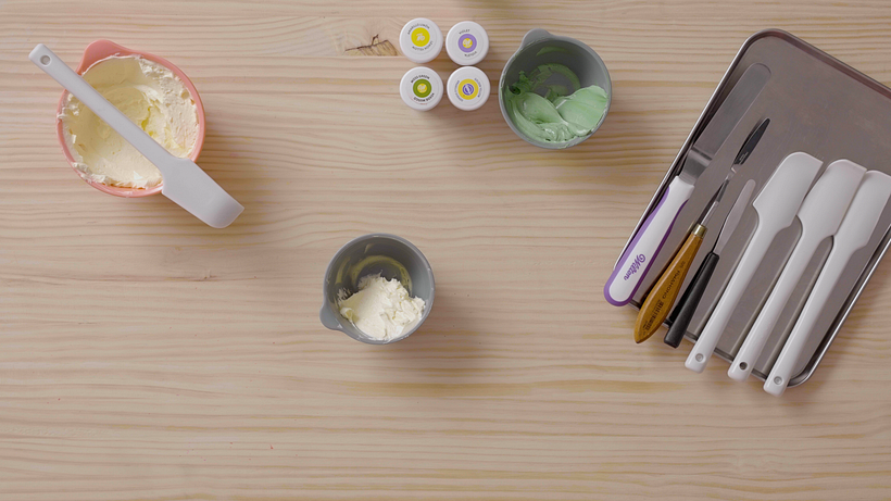 Equipment needed to decorate a cupcake.