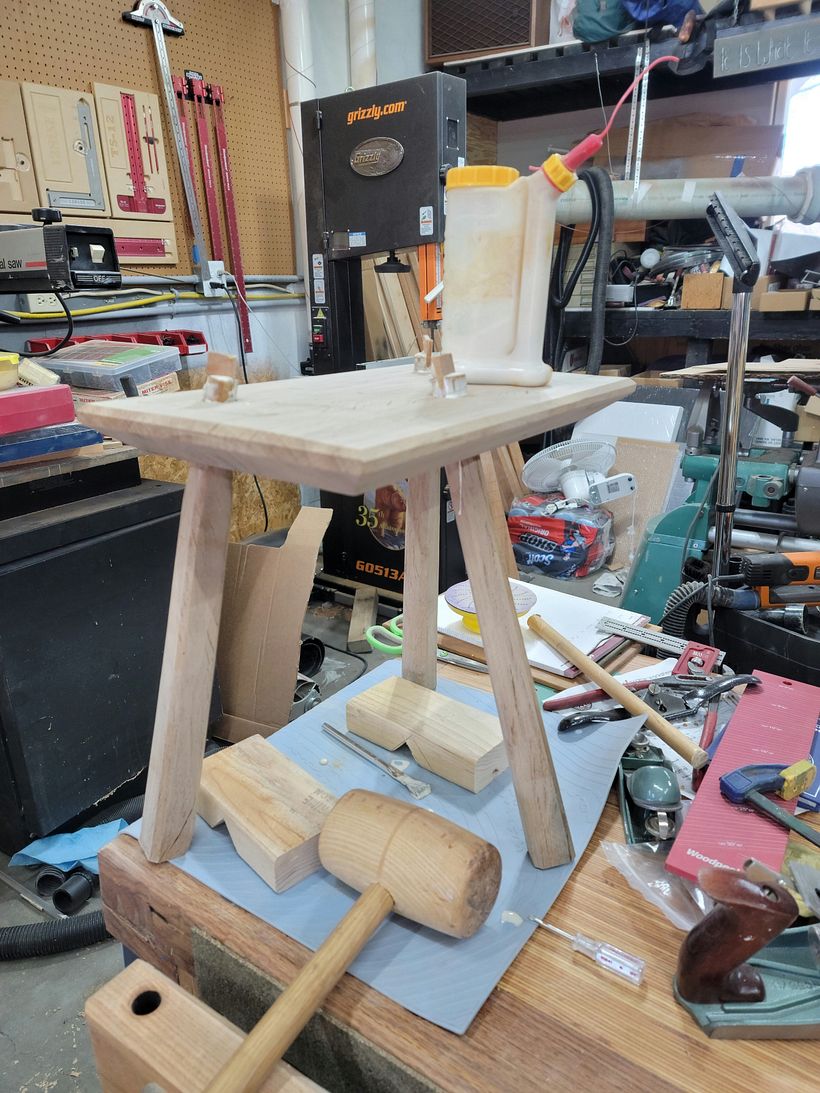 Gluing the legs and wedges in place 