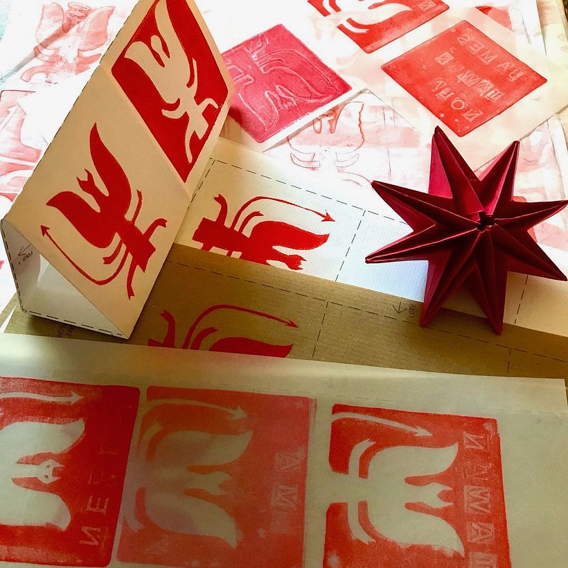 Paper folding, origami star, monoprinted gift tags and gift wrap.